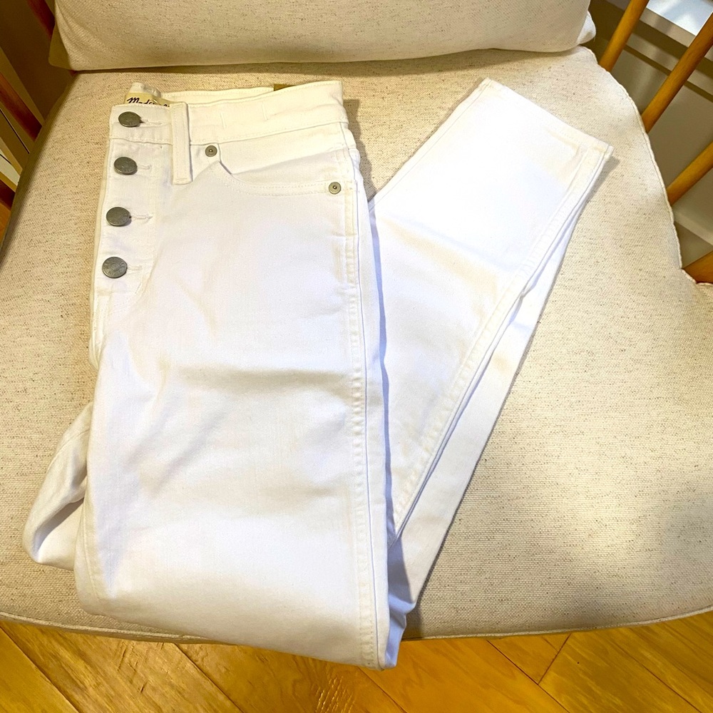 Madewell 27” high-rise skinny button up jeans.